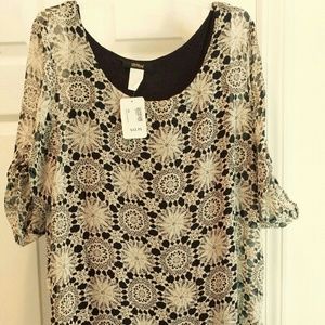 Dress with lace pattern.