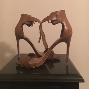 Single sole strap heels.