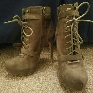 Olive green lace up heeled boots