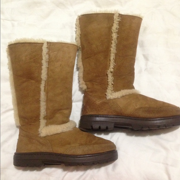 Tall chestnut Uggs. "100% Authentic"