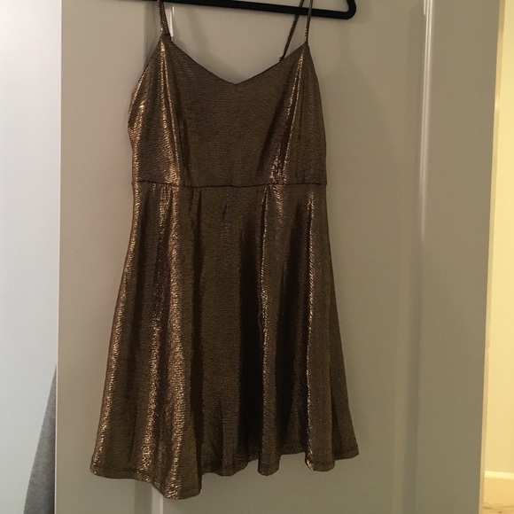 Flirty gold skater dress