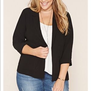 Plus size collared blazer in black.