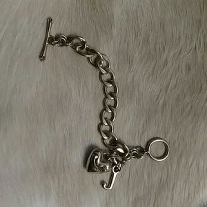 Gold Juicy toggle charm bracelet. Nice piece!