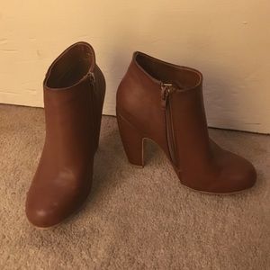 Brown faux leather booties.