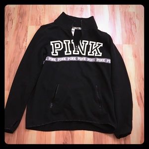 Pink 1/4 zip sweatshirt.