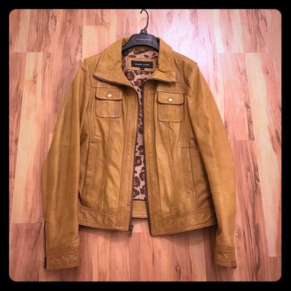 Women's black rivet leather jacket.