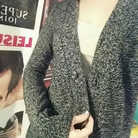Knit sweater with buttons and pockets
