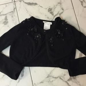 Bonnie Jean black long sleeve shrug. Jewels around neckline. Size 10