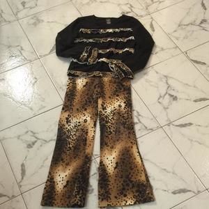 Leopard print flare leg pants and black and leopard ruffle top. Size 8. Copper Key Brand