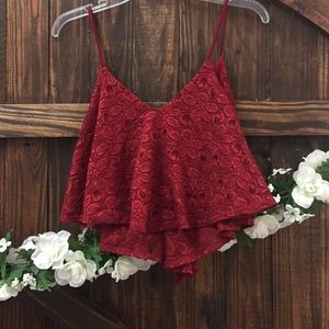 Holiday vibes with this low spaghetti strap top.