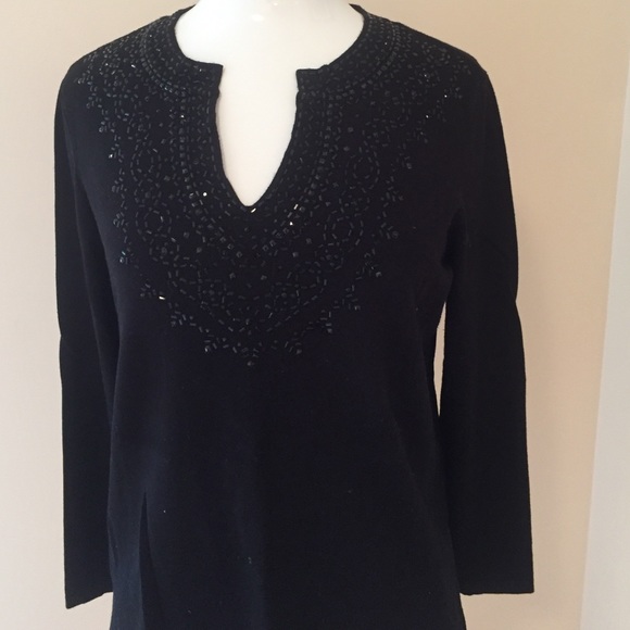 Long sleeved sequenced sweater