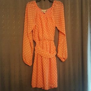 Orange dress with white polka dots