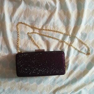 Purple gemstone clutch