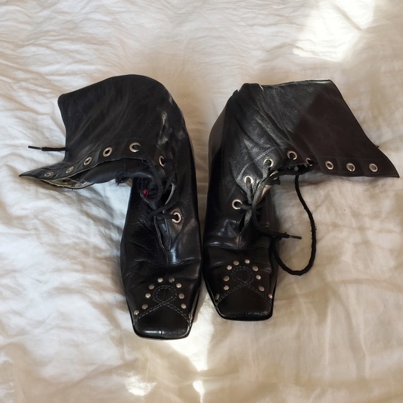 Black studded, leather, lace-up granny boots.
