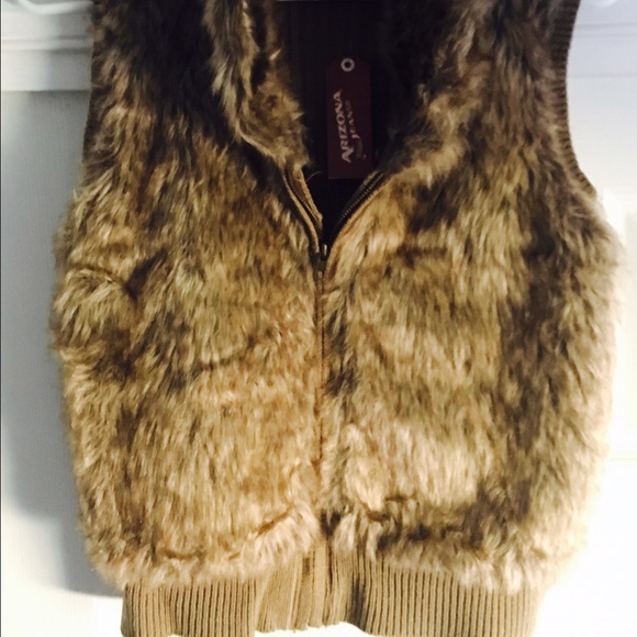 Sweater and Faux fur vest.