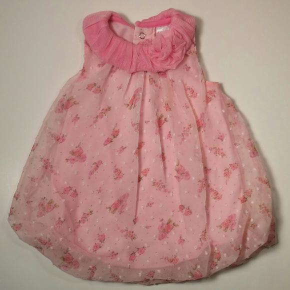 Baby Essentials adorable pink romper.