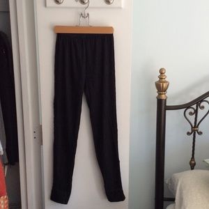 Faux denim leggings with lace detailed sides