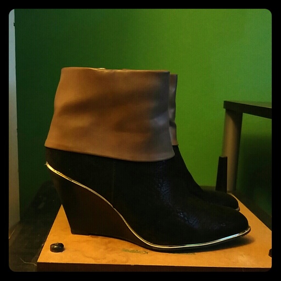 Black and tan wedge booties