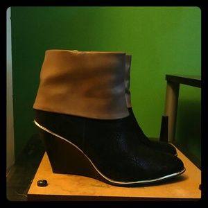 Black and tan wedge booties