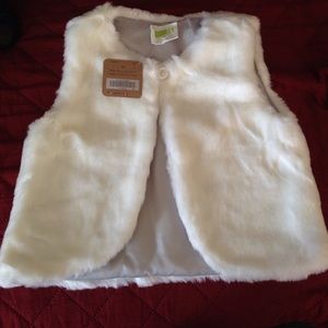 A New Toddler cream vest with tag