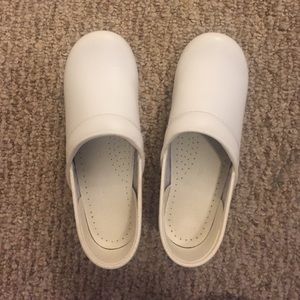 White Dansko nurse clogs