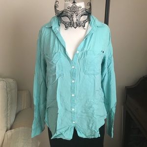 Teal button down shirt