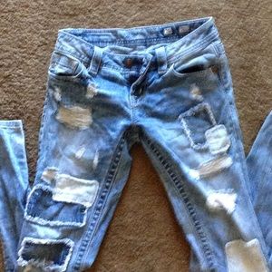 Miss Me ripped and repaired skinny jeans