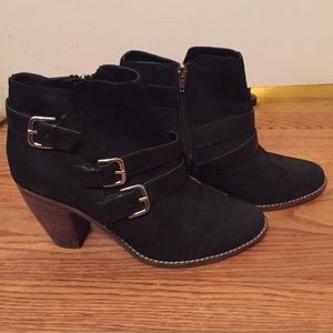 Black and silver three buckle booties