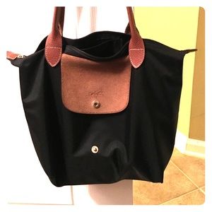 Medium black longchamp bag.