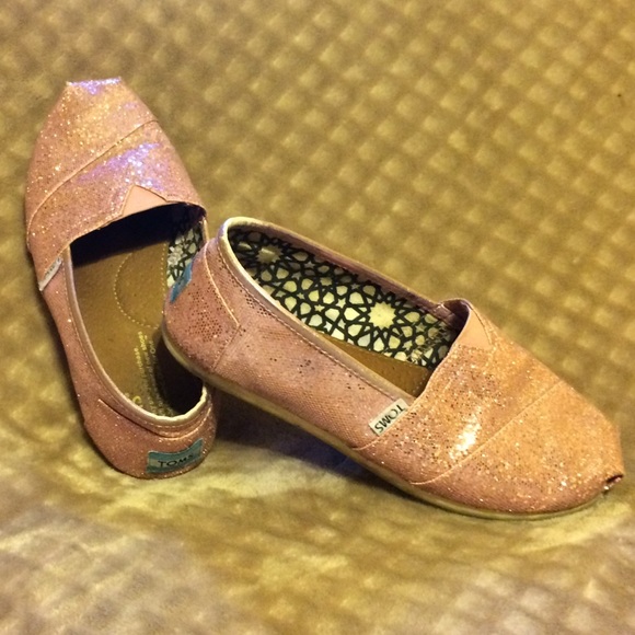Sparkly light pink TOMS slipons