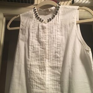 White sleeveless button down with jeweled neckline