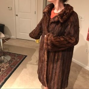 Calf length mink fur coat.