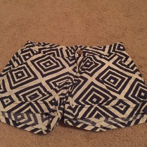 Navy blue and white patterned shorts