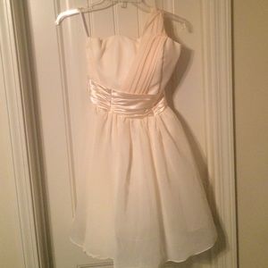 2 cream/champagne bridesmaid dresses.