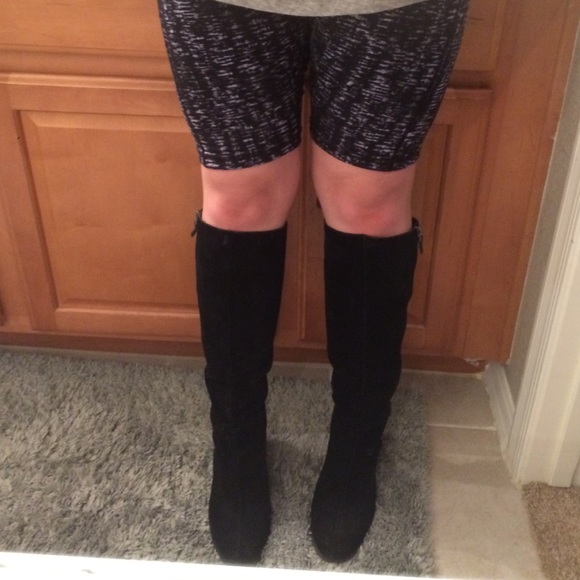 Black up to knee high wedge heel boots