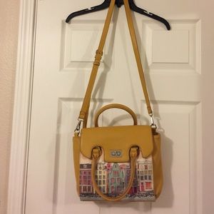 Cute Mustard colored purse with beautiful details