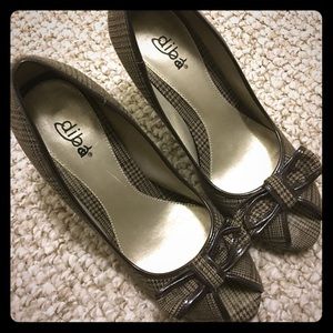 Brown plaid peep-toe pump.