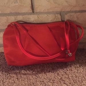 Red clutch bag