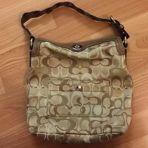 Well-used Coach purse
