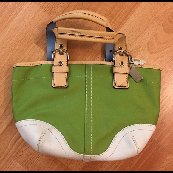 Well-used lime green Coach purse