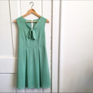 Sage dress with neck tie by Fleet Collection