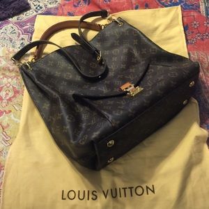 Faux Louis Vuitton handbag.