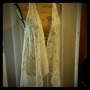 Very feminine cream colored lace shrug
