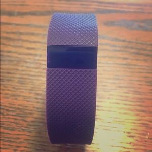 Plum regular size Fitbit Charge HR.