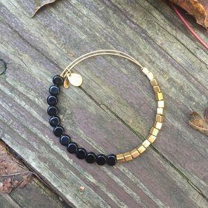 Rare Alex + Ani black & gold bangle.