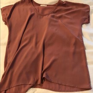 Loose fitting shirt.