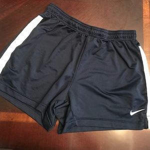 Navy and white Nike shorts