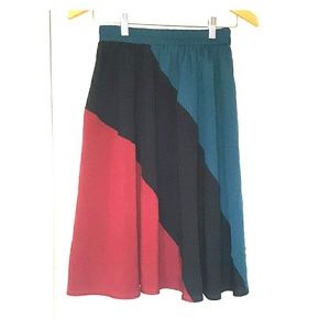 Three colored skirt with subtle pleating