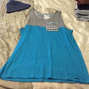 Men's blue tank size L. Similar to Volcom