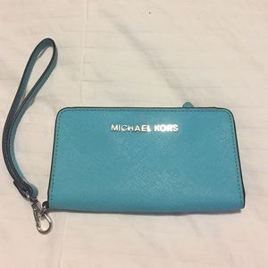 Never used small Michael Kors wristlet